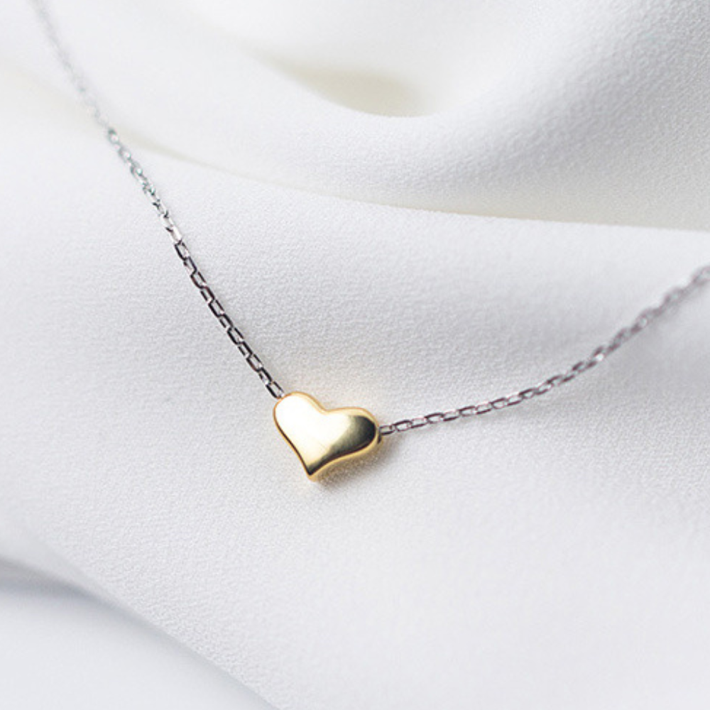 Collar de Plata con Colgante de Corazón Dorado